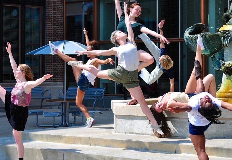 Students dance on the steps of Northrop