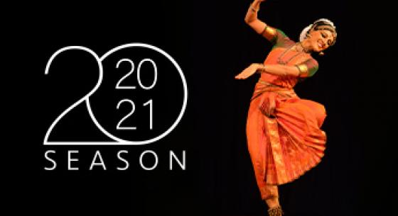 A white 2020-21 Season logo on a black background, next to a female dancer in an orange dress.