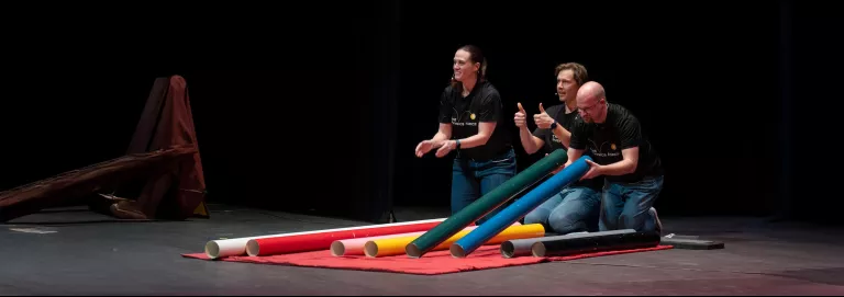 Physics Force team demonstrating with colorful balls and tubes