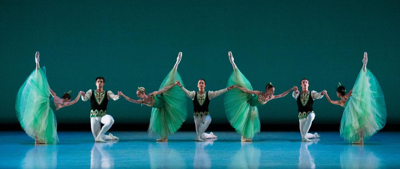 Ballet dancers dressed in green costumes