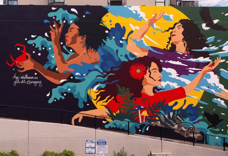 A colorful illustration of a variety of women in water