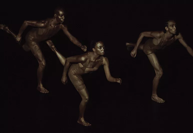 TRIBE image. Three dancers against a black background. From the BLACK HOLE – Trilogy And Triathlon.