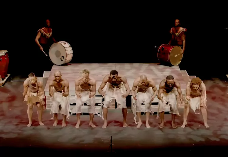 Step Afrika dancers on stage