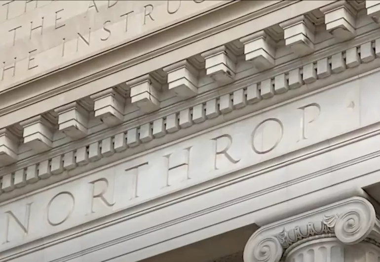 Detailed view of engraving above the columns outside of Northrop