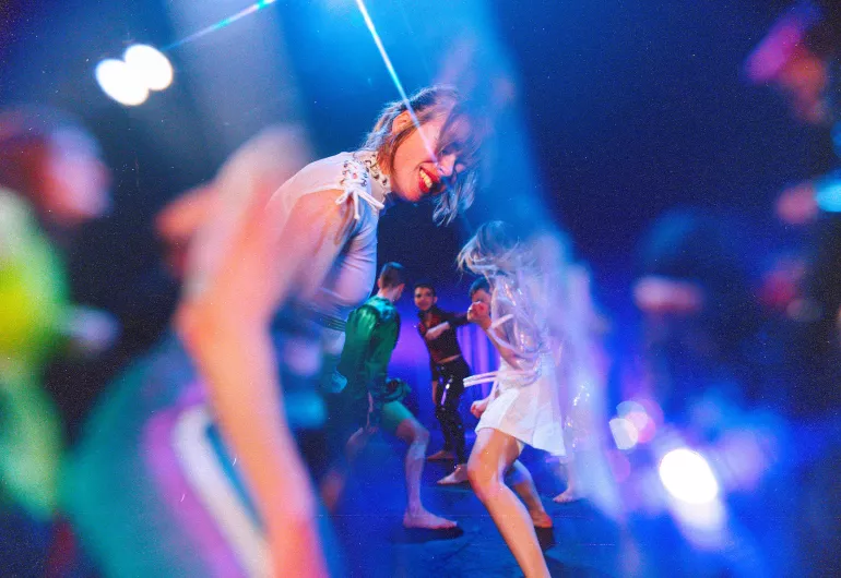 Dancers moving in and out of focus