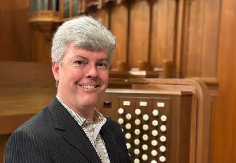 John Orfe at the organ