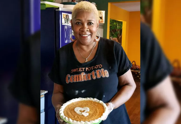 Rose McGee holds a pie.