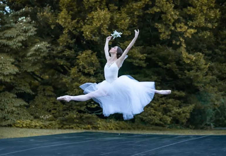 Skylar Brandt leaps outside in costume