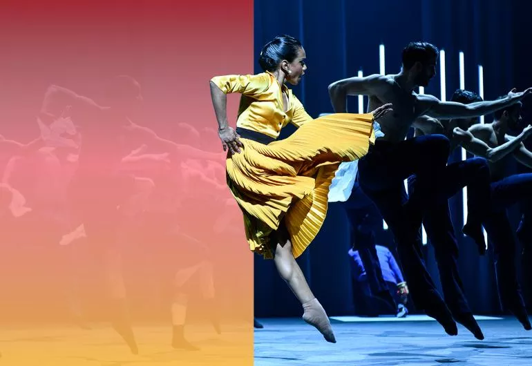 Dancer in yellow dress mid-air