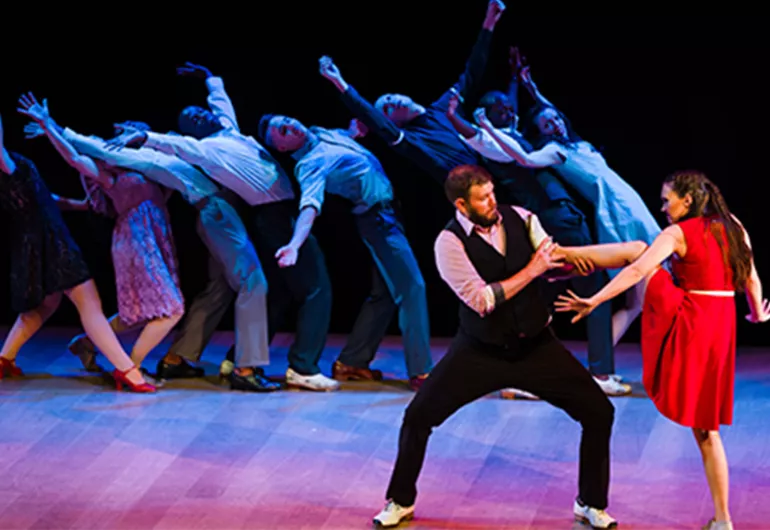 Dorrance Dancer performers on stage.