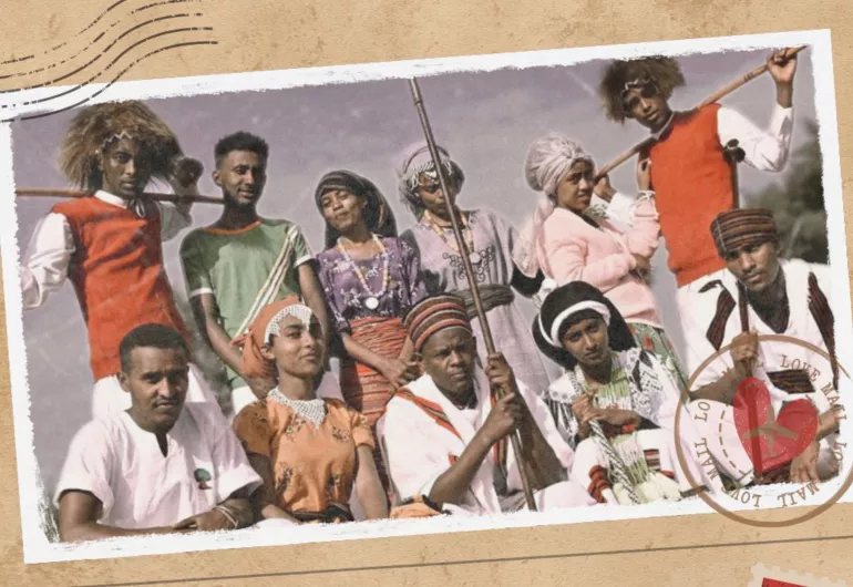 A group of ten people in colorful traditional attire pose for a portrait with a vintage postcard style.