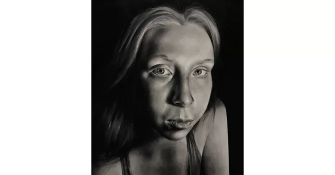 head and shoulders drawing of the artist looking straight on