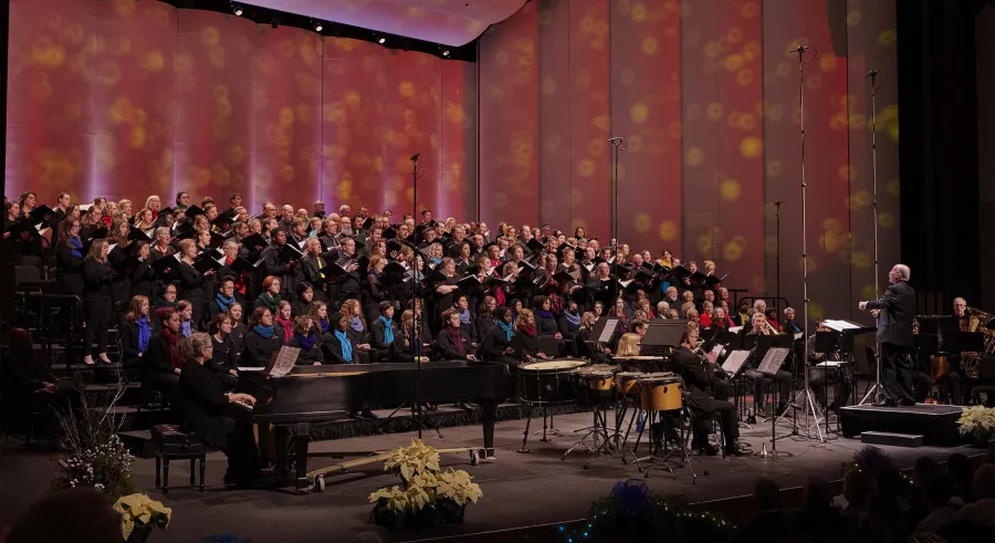 Philip Brunelle and VocalEssence on stage.