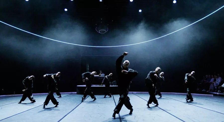 A a | a B - BEND company dancing in sync.
