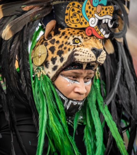closeup of a leopard headdress and makeup