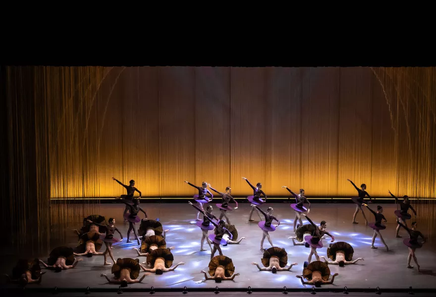 Image of dancers performing on stage.