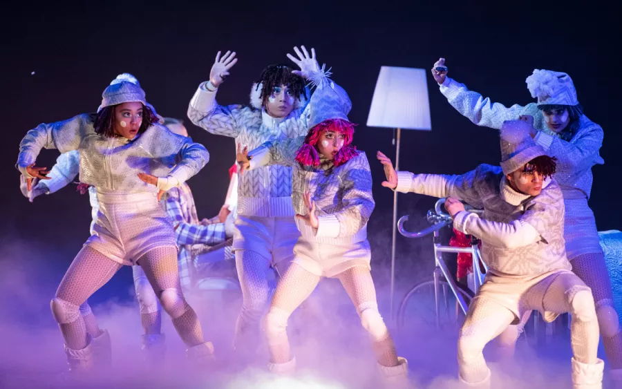 Dancers in white winter clothes