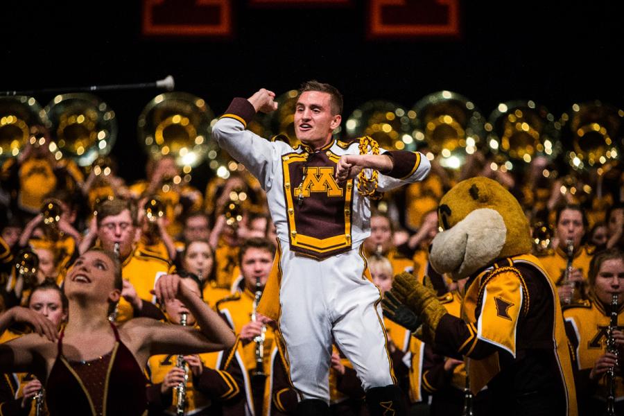 Drum Major in front of band with Goldy