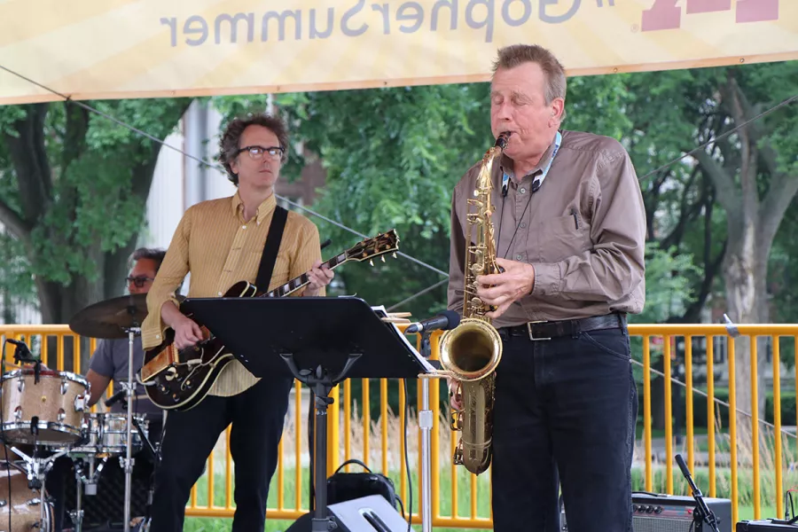 Jacques Wait on guitar and Max Ray on saxophone
