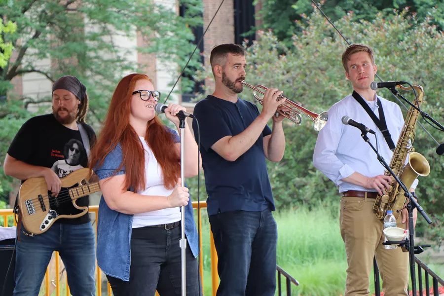 Mae on stage with Bassist David Kellermann, Trumpeter Paul Pederson and Keaton Judy on Saxophone