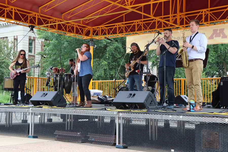 Mae Simpson band on stage July 17 2019 for Music on the Plaza at Northrop