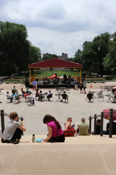 Watching a band play in the tent on the Plaza
