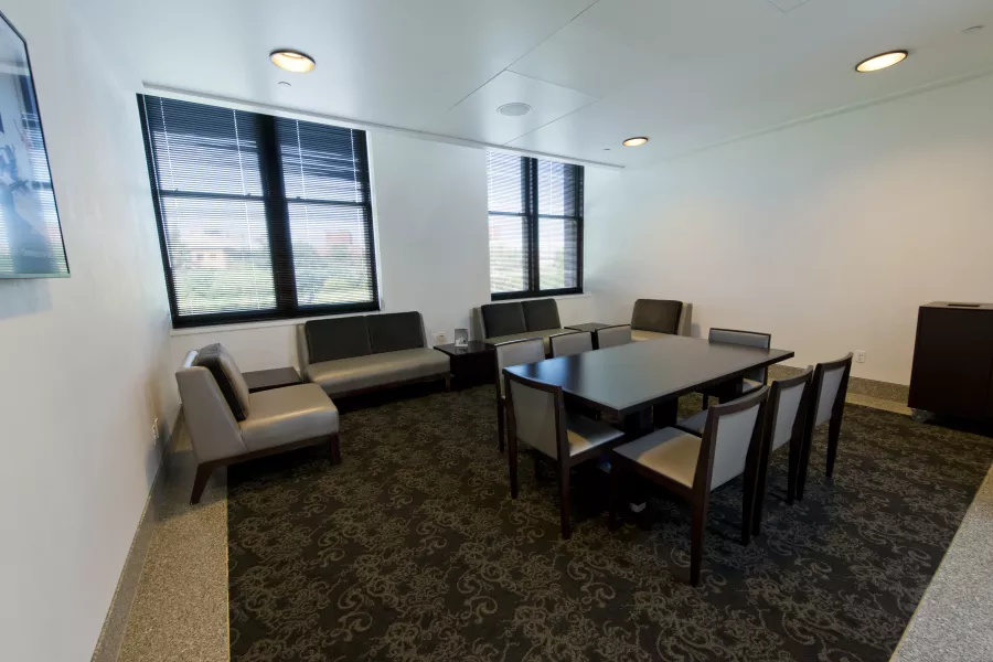 View of table and chairs and lounge seating